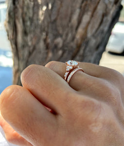 Rose Gold Oval Engagement ring with accent round stones