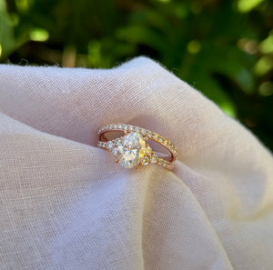 Rose Gold Oval Engagement ring with accent round stones