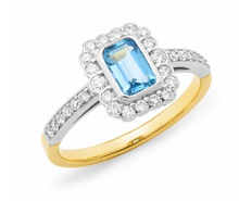 Load image into Gallery viewer, Aquamarine emerald cut with surrounding diamonds