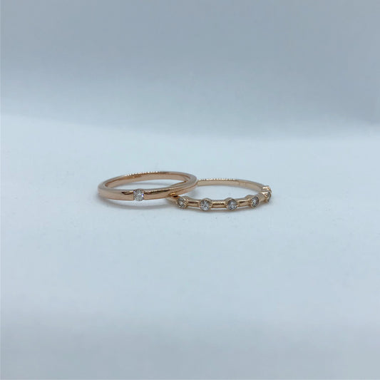 Dainty Design Rose Gold ring with suspended diamond